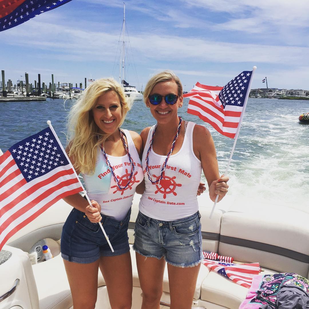 Two SCD crew members enjoying our annual 4th of July boat party!